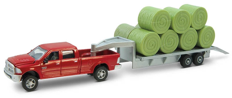 1:64 Ram® Pickup Toy with Flatbed Trailer and Round Bales | CASECE | CA | EN