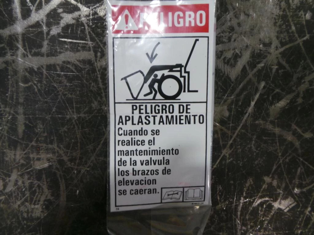 Autocollant associé au danger - Risque d'écrasement - Espagnol | NEWHOLLANDAG | CA | EN